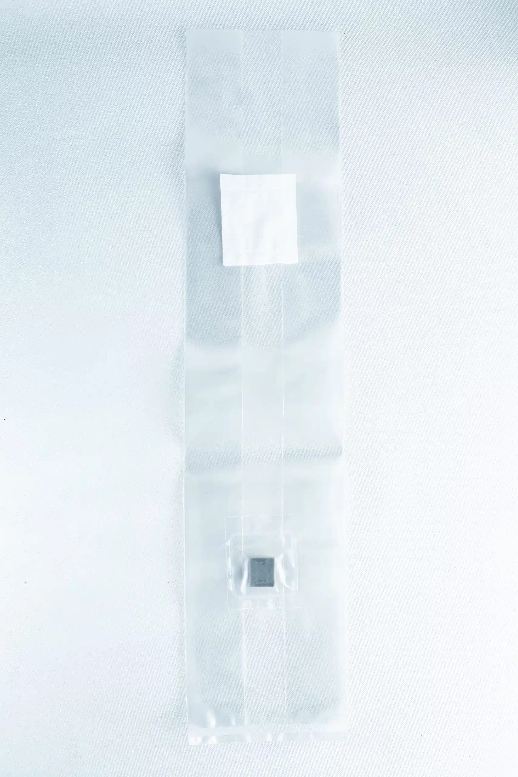 Unicorn Mushroom Grow Bags for spawn and substrate 5 The Mushroom Grow Bags Unicorn for spawn and substrate is a clear plastic bag with a white label and a small dark square inside, perfect for mushroom cultivation, shown on a white background.