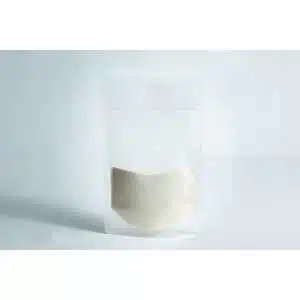 A clear resealable pouch, half-filled with light beige Agar Mix MYAG Antibacterial Malt Extract Yeast powder, shown on a plain white background.