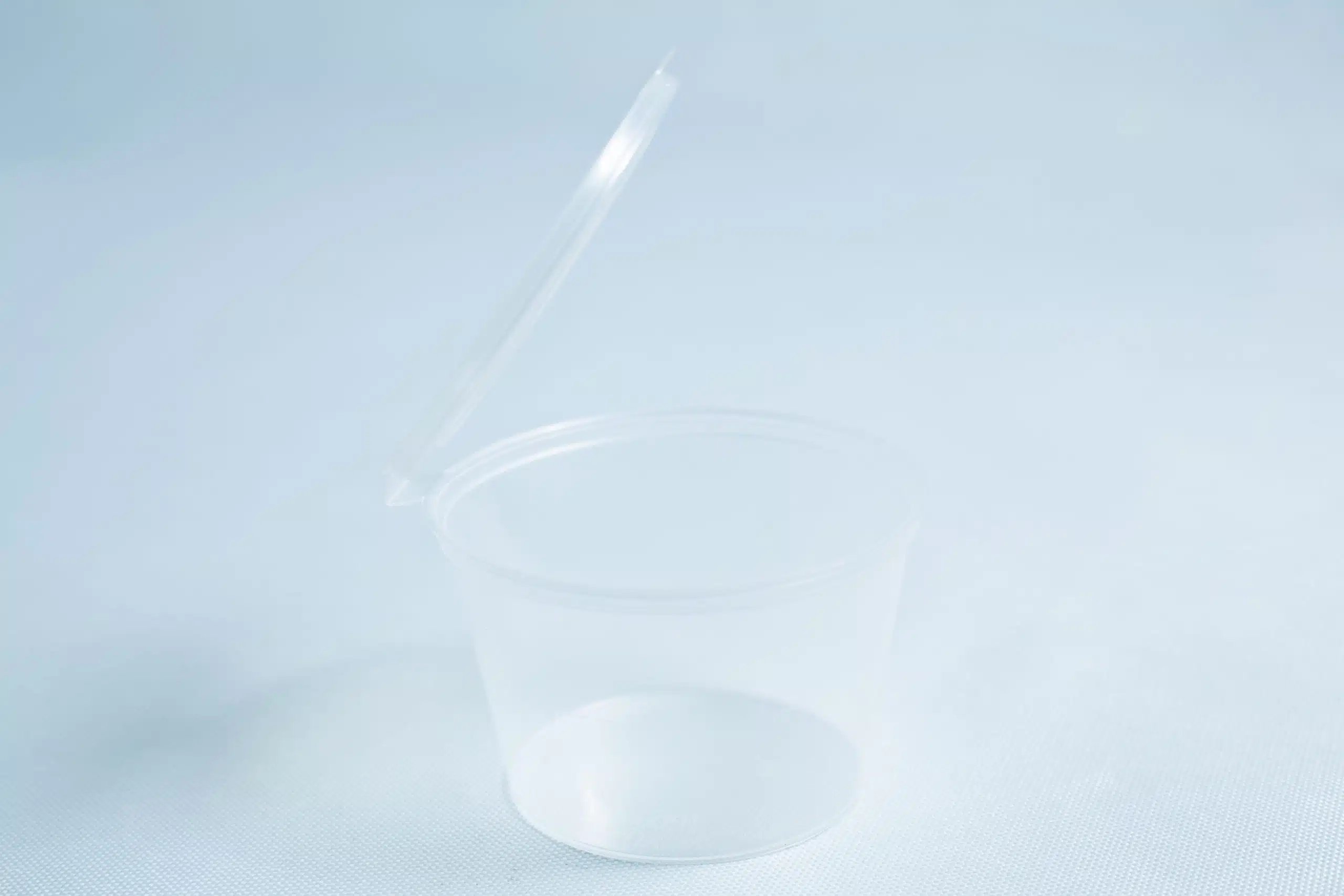 Agar Container - Alternative to Petri Dish (50 x 100ml) with an open hinged lid, displayed on a light blue surface.