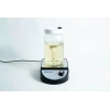 Ball mason jar with stirrer inside and magnetic stirrer machine