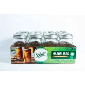 Ball Mason jars 1 litre 12x for canning autoclavable, come in a green and white box with metal lids. Ideal for preserving, canning, or storage.