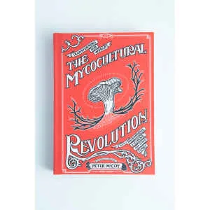 The Mycocultural Revolution: Book by Peter McCoy is a red mycology book featuring an illustrated mushroom on the cover.
