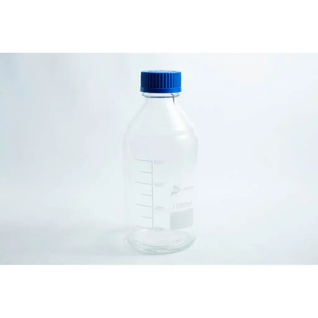 A Reagent bottle 1000ml made of clear glass with measurement markings and a blue screw cap.