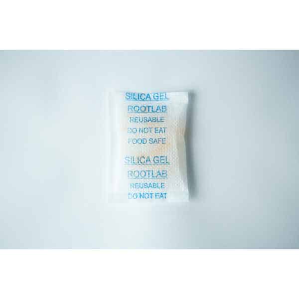 A white Desiccant Silica Gel 5g | Reusable packet labelled DO NOT EAT and FOOD SAFE on a plain white background.