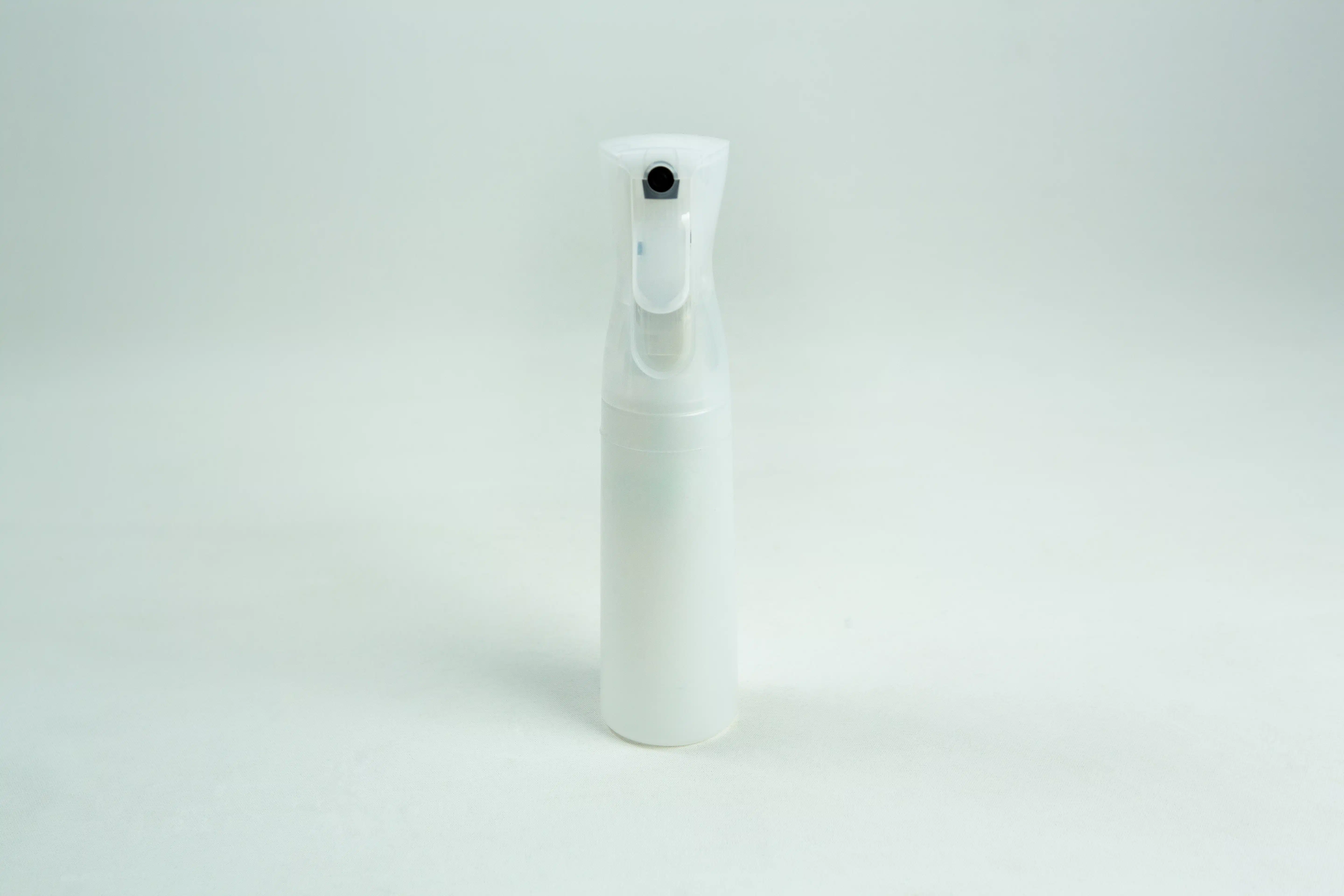 A 300ml Spray Bottle Atomiser Mushroom Fine Mist stands upright on a plain white background, featuring a durable spray mechanism.