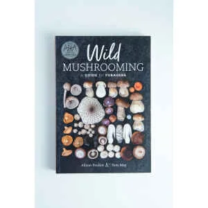 Explore Wild Mushrooming: A Guide for Foragers Book by Alison Pouliot and Tom May—ideal for nature lovers eager to start their foraging journey.