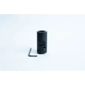 A black metal cylinder with a hole, next to a small L-shaped hex key on a white background.