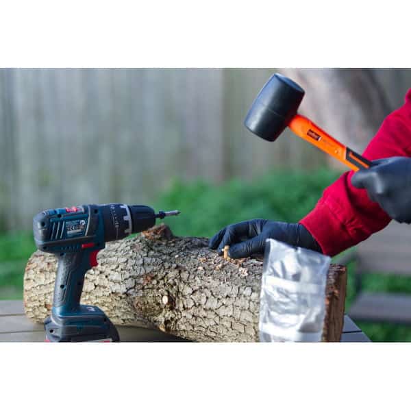 Putting colonized dowel in a wood stick