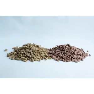 Two piles of brown and beige animal feed pellets on a white background.