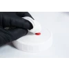 This picture shows high temperature RTV Silicon being applied on a Liquid culture Jar.