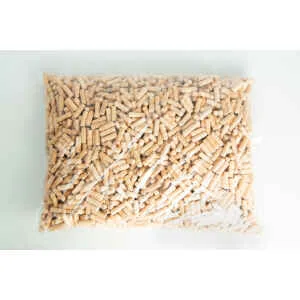 A clear plastic bag filled with small, cylindrical wooden pegs on a white surface.