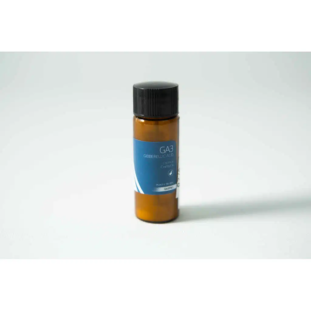 A small brown bottle with a blue label reading "Plant Cell Gibberellic Acid (GA3) Powder" sits on a white surface.