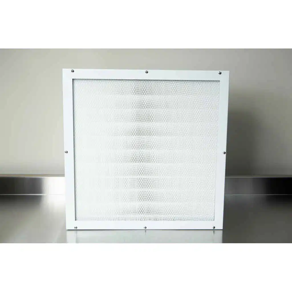 The Laminar Flow Hood HEPA Airfilter H14 with prefilter (60x60x35cm) and metal frame is shown on a reflective stainless steel surface.