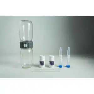 A water testing kit with bottles, vials, dropper, and containers on a grey background—ideal for use with your Plantcell Synthetic Seed Starter Kit to ensure optimal hydration and healthy plant growth.
