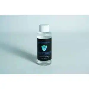 A small bottle labelled Long Needle Disinfectant Spray with a white cap on a light background.