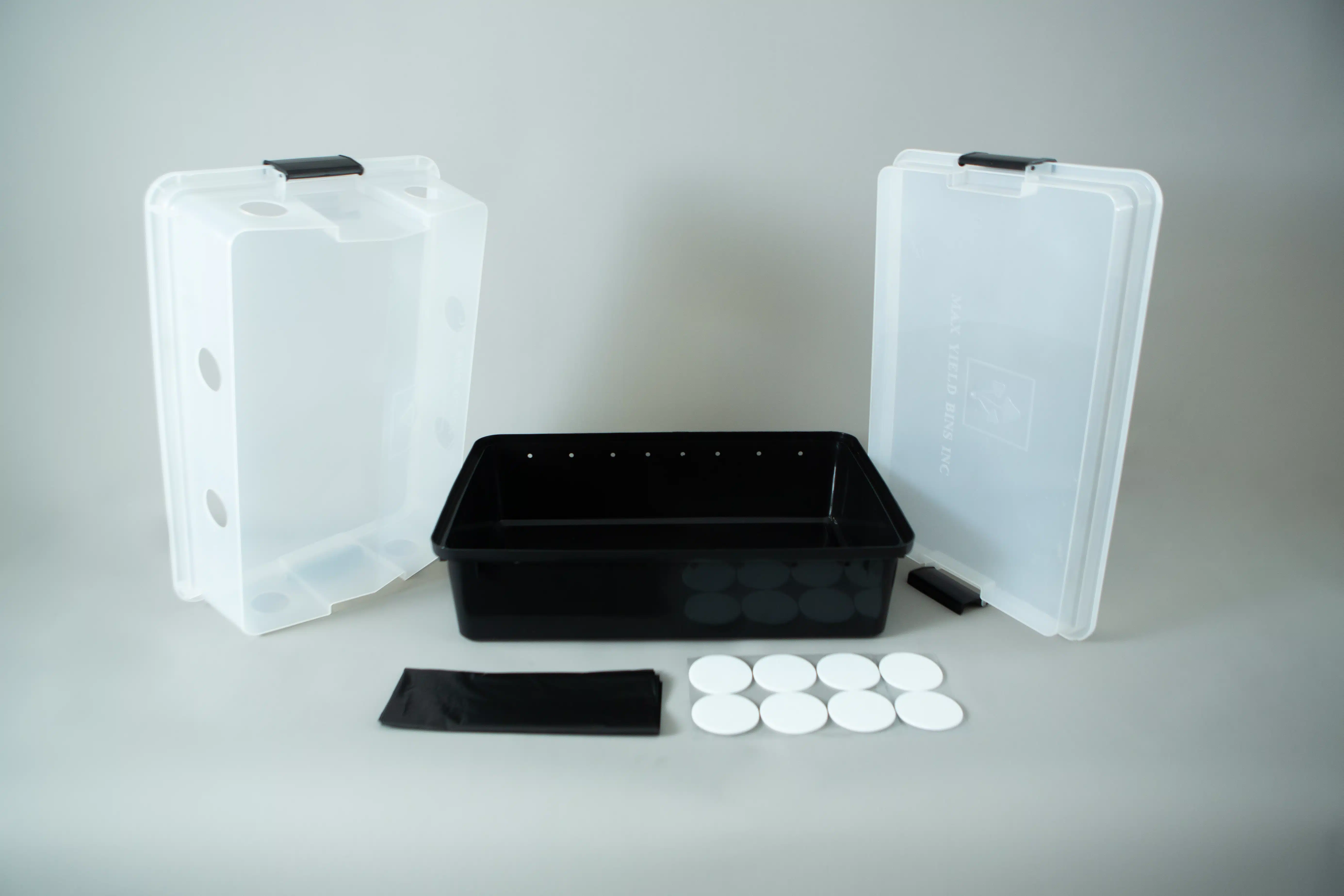 Monotub kit for Growing mushrooms- Max Yield Bins 1 Plastic mushroom growing kit with a black tray, Colonisation Lid, two clear lids, filter discs, and a black filter patchโideal for growing mushrooms at home.
