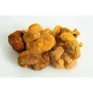 A cluster of wild, brown, fuzzy Freeze-Dried Mushroom Lion’s Mane on a white background.