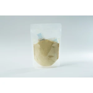 A clear plastic pouch containing light brown Freeze-Dried/ Dehydrated Mushroom Lion's Mane powder with a small silica gel sachet inside.