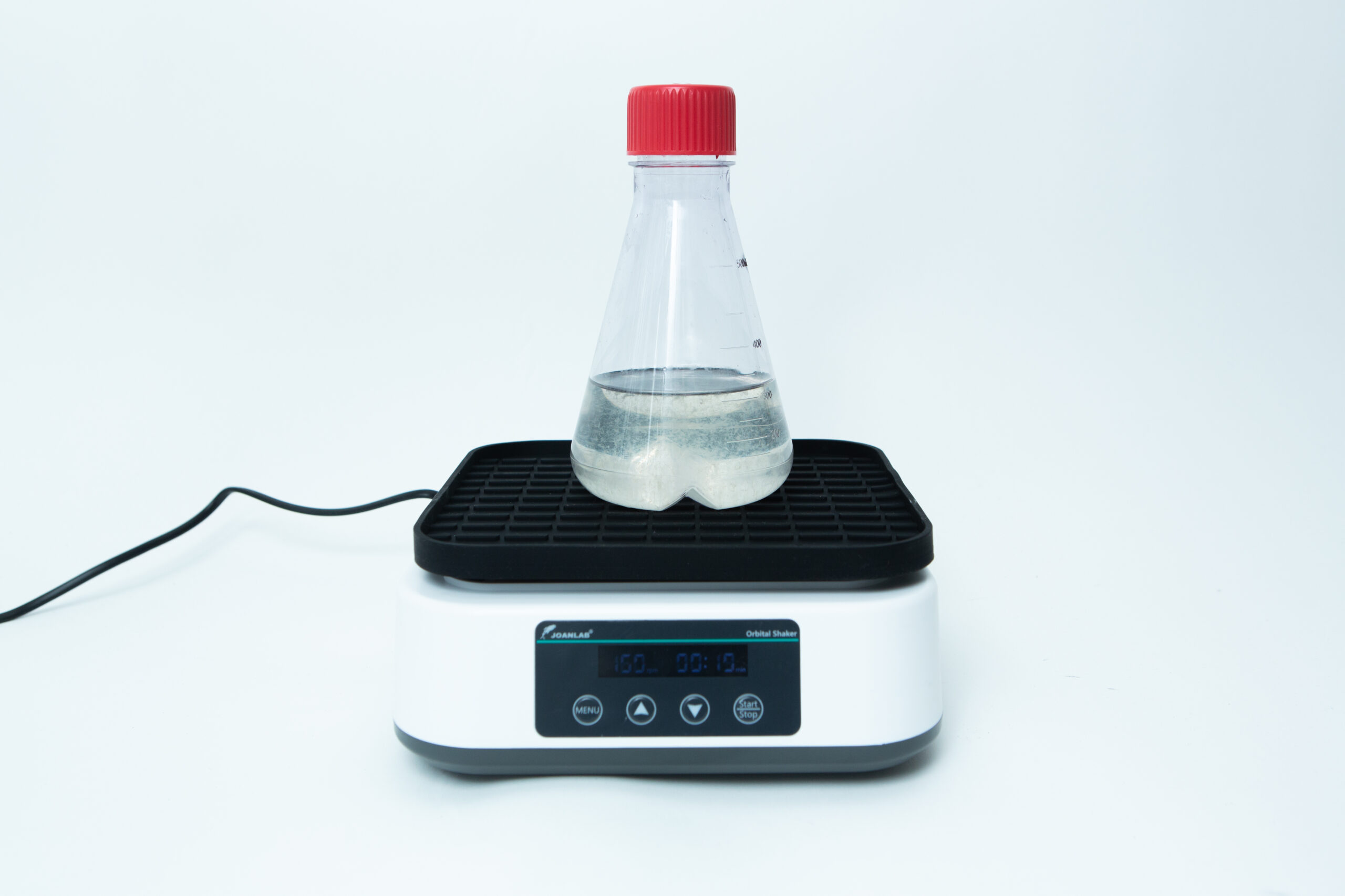 Laboratory Orbital Shaker | 200RPM | 220V | AU Plug 4 A clear flask with liquid sits on an electronic laboratory stirrer with a digital display.
