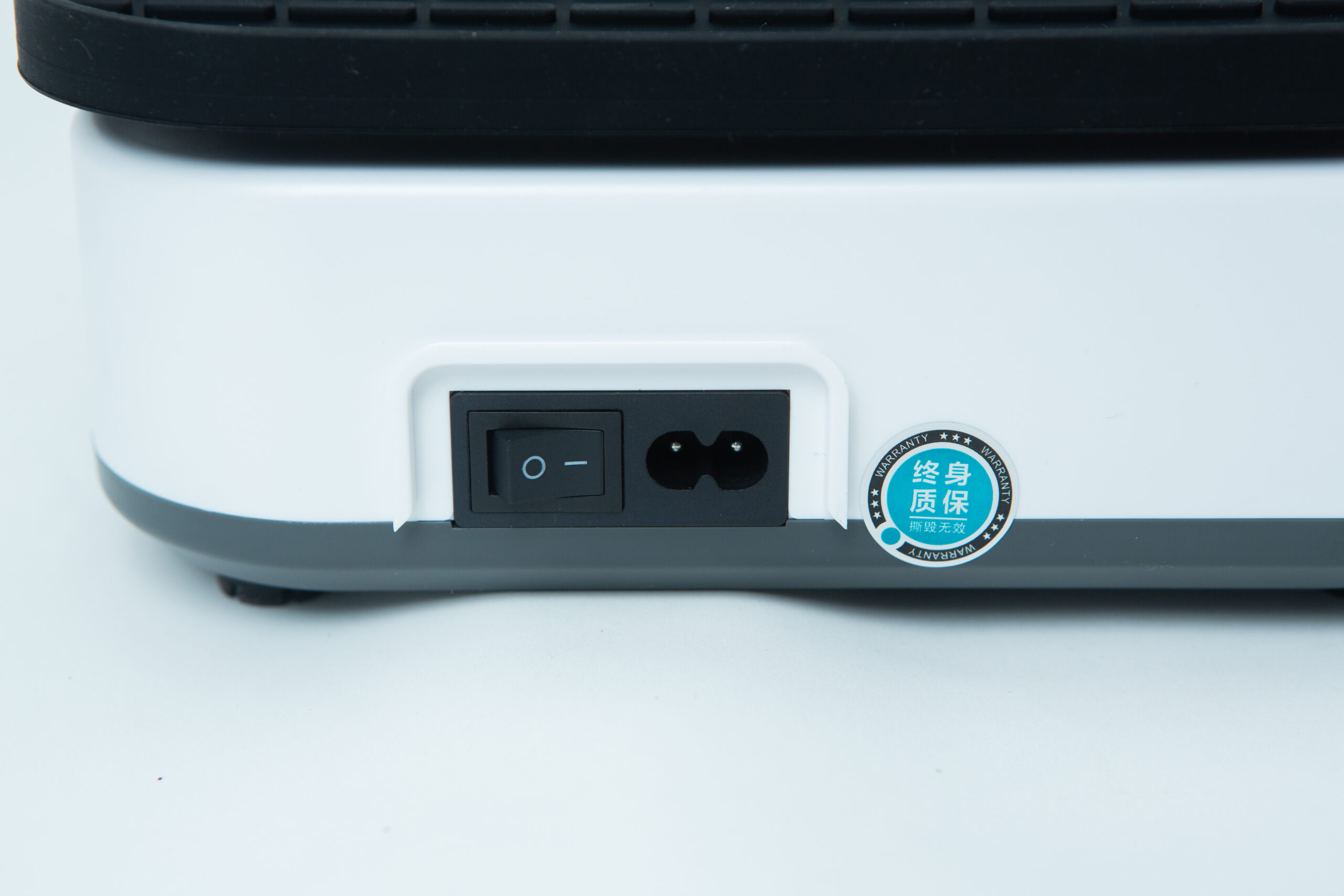Laboratory Orbital Shaker | 200RPM | 220V | AU Plug 5 Close-up of a power switch and socket on a white and grey electronic device, with a blue sticker beside them.