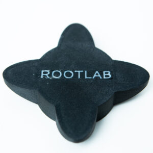 Home 16 A black, four-pointed object with ROOTLAB written on it, placed on a white background.
