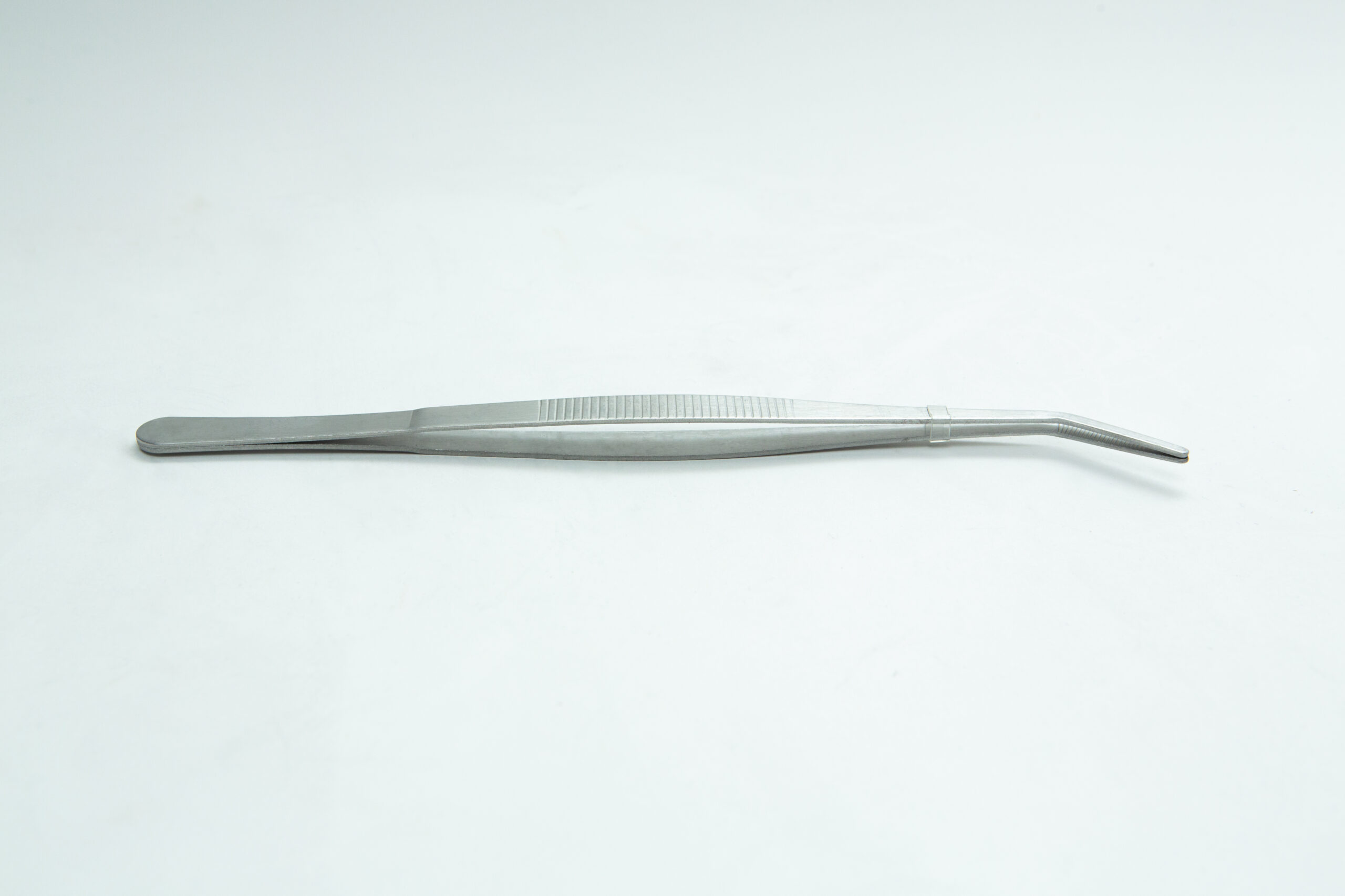 Stainless Steel Plant tissue culture Lab Forceps | Curved & Straight Tips | 15cm 2 A pair of metal tweezers with a bent tip on a plain white background.
