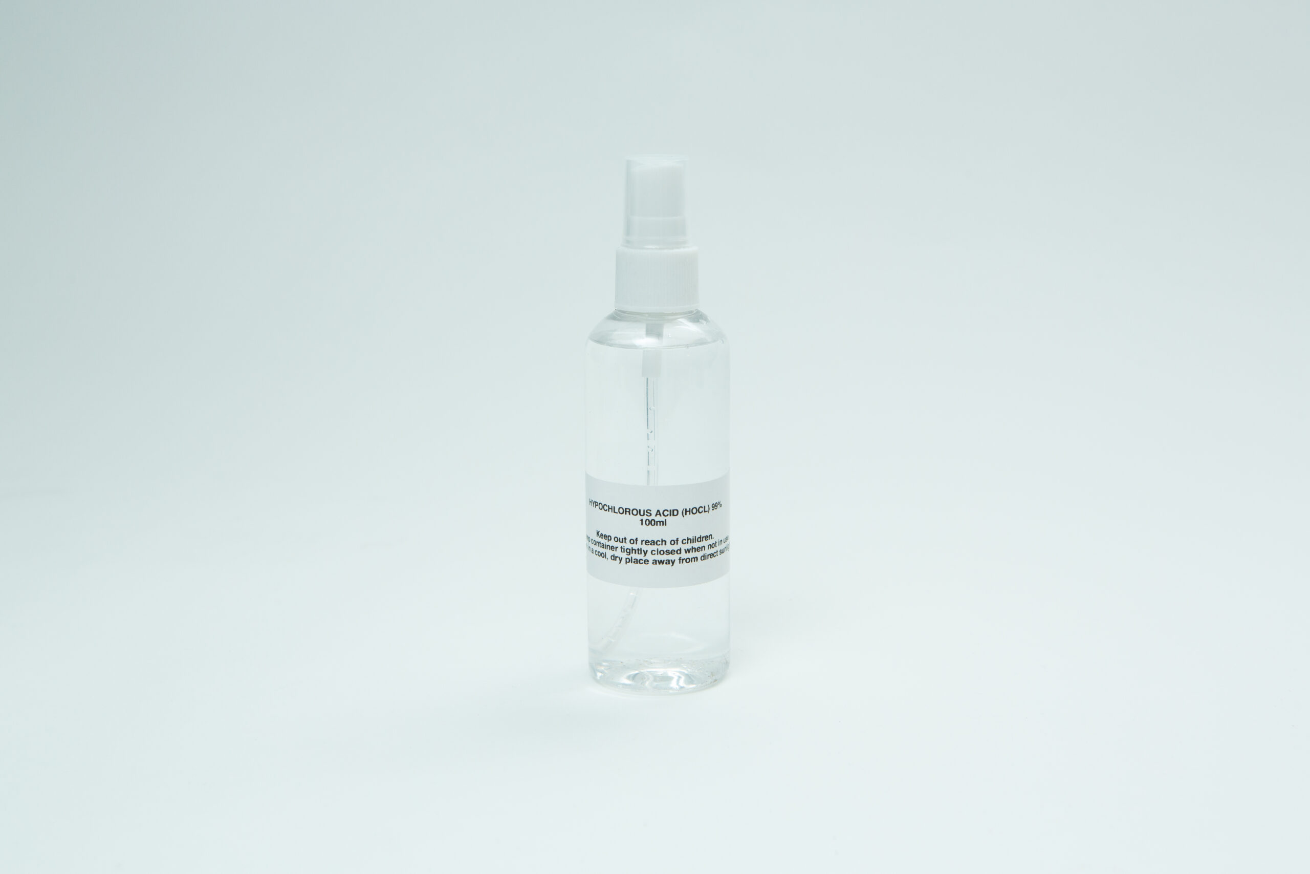 Hypochlorous Acid (HOCL) | PPM 40 6 A clear spray bottle with a white label and cap, set against a plain white background, contains Hypochlorous Acid (HOCL) | PPM 40โformulated for effective yet gentle cleaning on multiple surfaces.