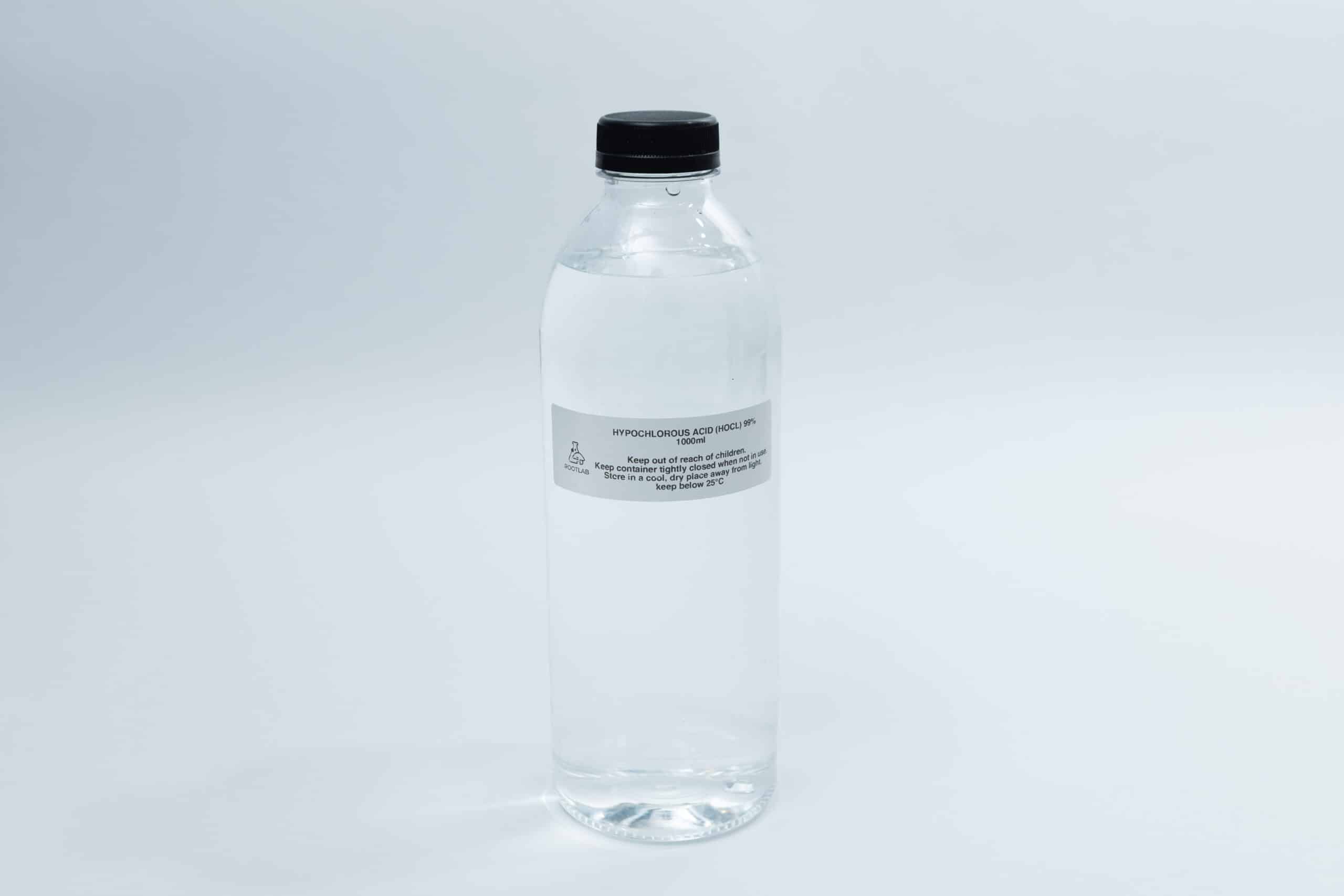 Hypochlorous Acid (HOCL) | PPM 40 11 Clear plastic bottle with a black cap and a white label, filled with transparent liquid, on a white background.