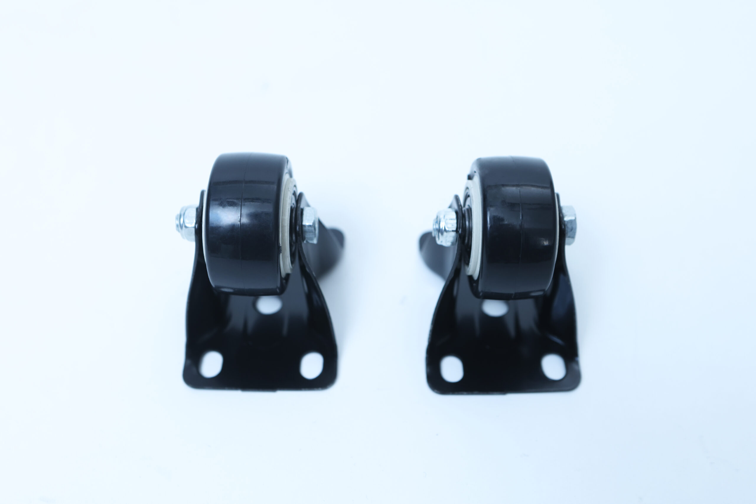 Industrial Heavy duty Ultrasonic Fogger 15L/H, Humidifier (AU 220V) 7 Two black swivel castor wheels with mounting plates, placed side by side on a white background.