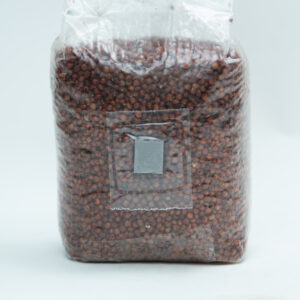 Home 7 A sealed plastic bag filled with small brown seeds or grains on a plain white background.