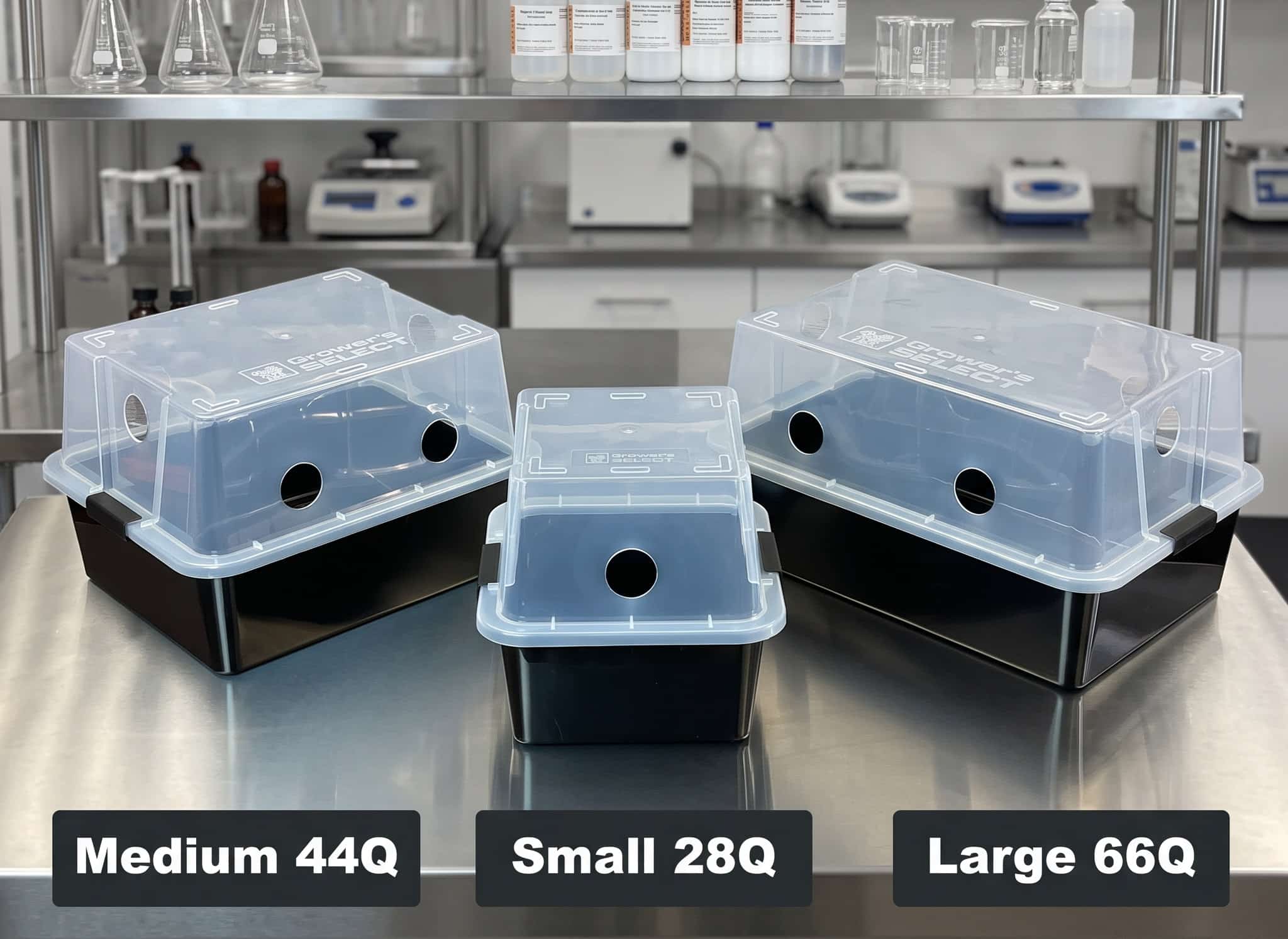 Mushroom Monotub Fruiting Chamber : Hard case 1 Three black containers labelled Small 28L, Medium 44L, and Large 66L sit on a lab table with clear lids.