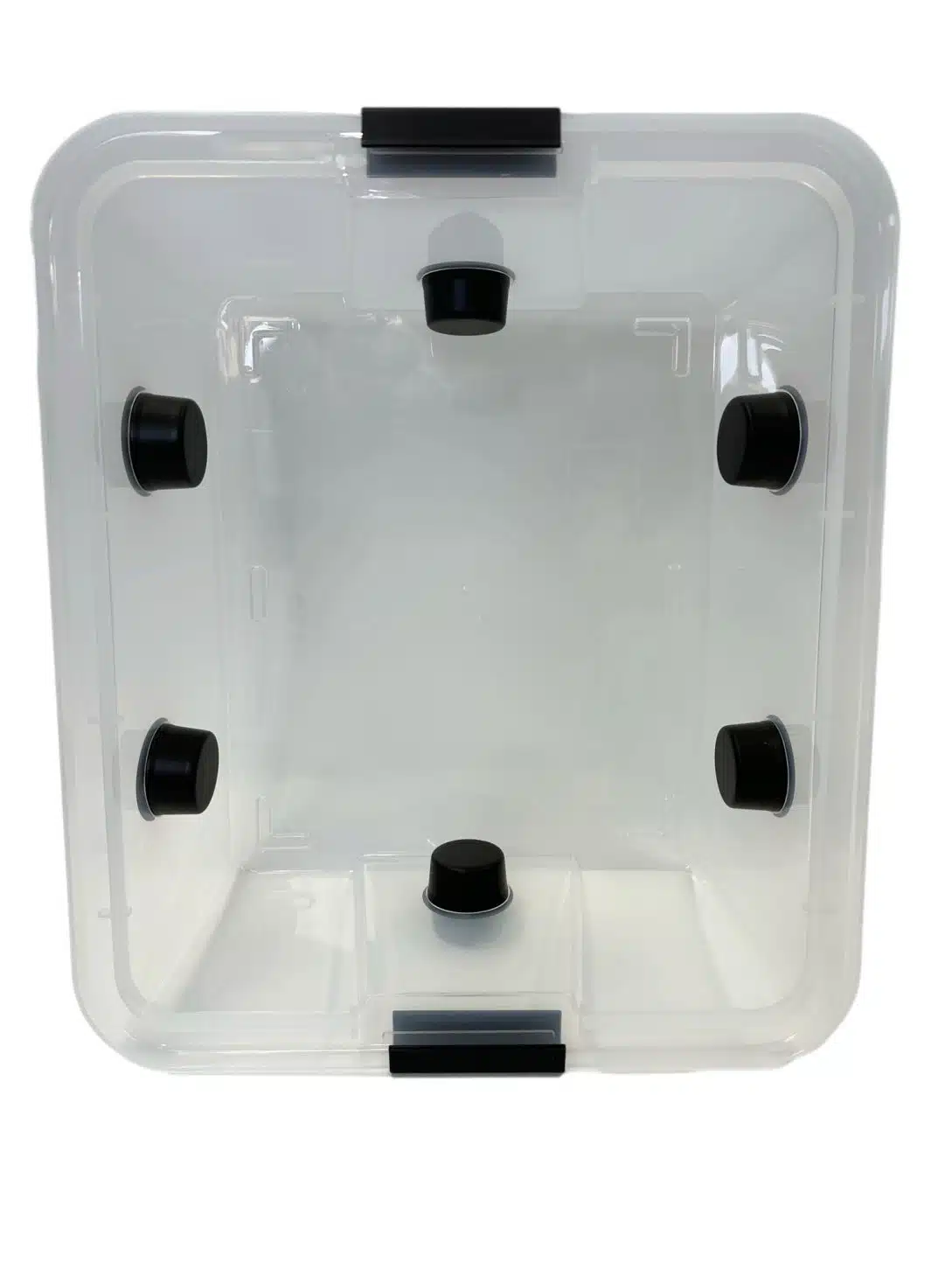Mushroom Monotub Fruiting Chamber : Hard case 4 Clear plastic box with five black circular ports on its sides and three black catches on the rim.