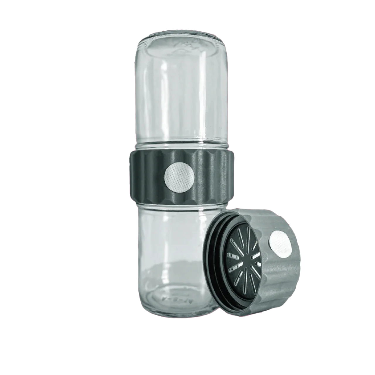Plant Cell BioTilt™ 8 5 Two clear glass containers with metallic lids—one upright, one on its side—evoke the precision of a Plant Cell BioTilt™ 8 experiment or the innovative design of the Plant Cell BioTilt™ 8 laboratory equipment.