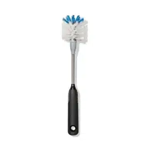 Bottle brush with a black handle, white bristles, and blue bristle tips, on a white background.